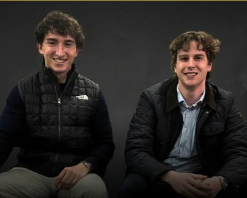 Andy Robbins and Noah Kruthaupt photographed for AI Answered
